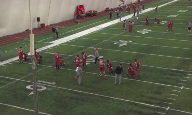 Near Foot Tackle (On Knees)- Rutgers